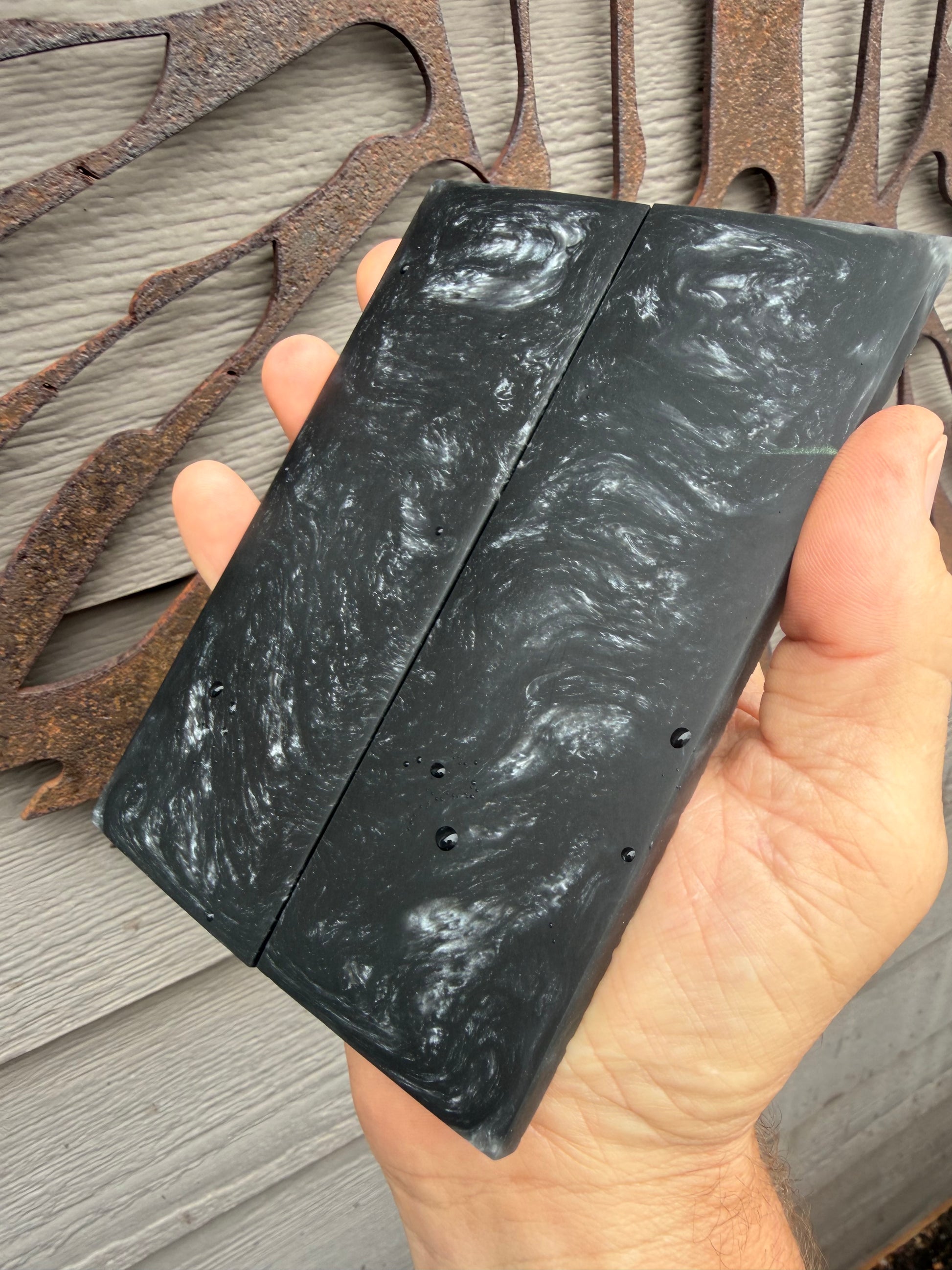 Custom resin knife scales.  Black steel 